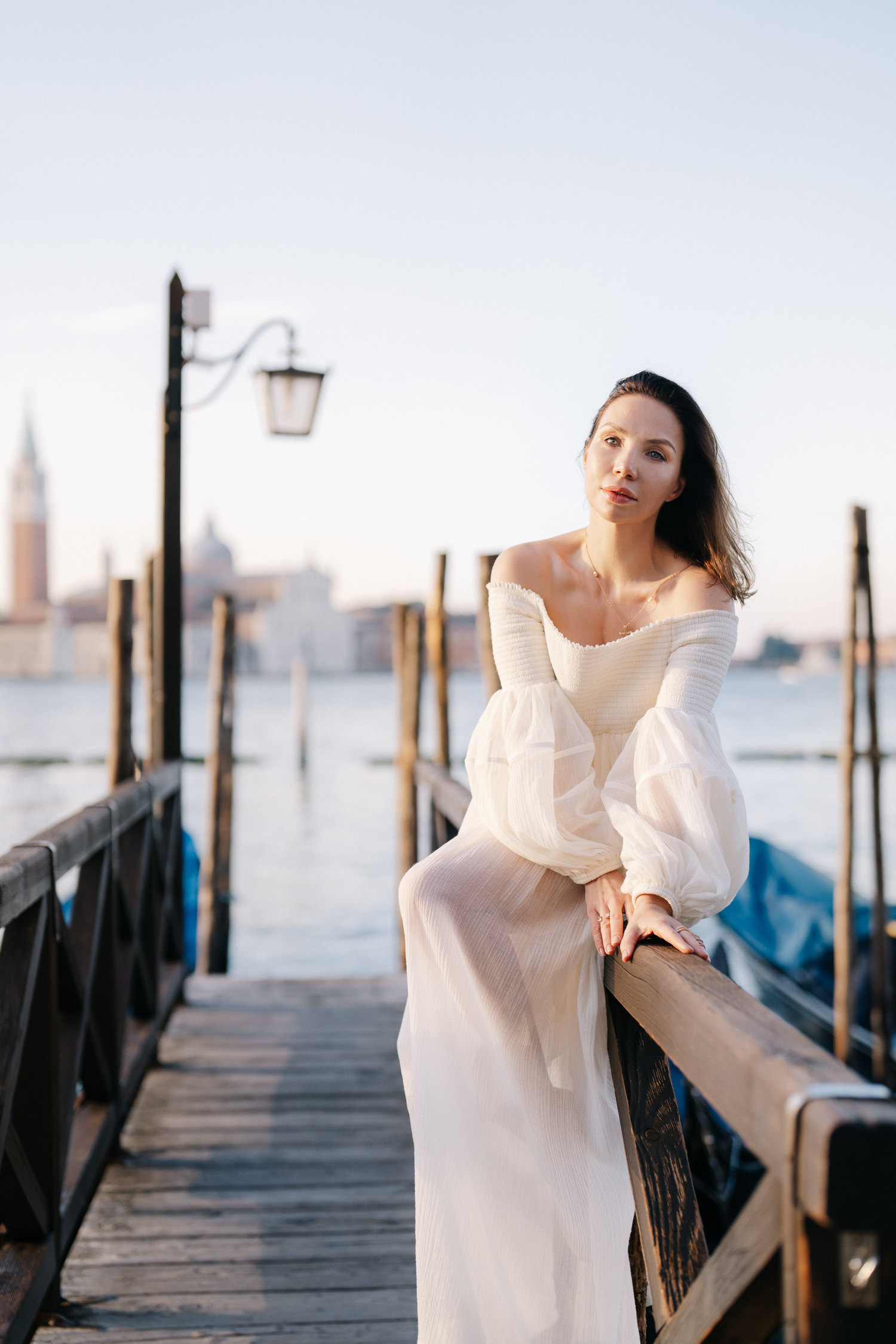 how to pose for a portrait sunrise photoshoot in St Mark's Square in Venice.