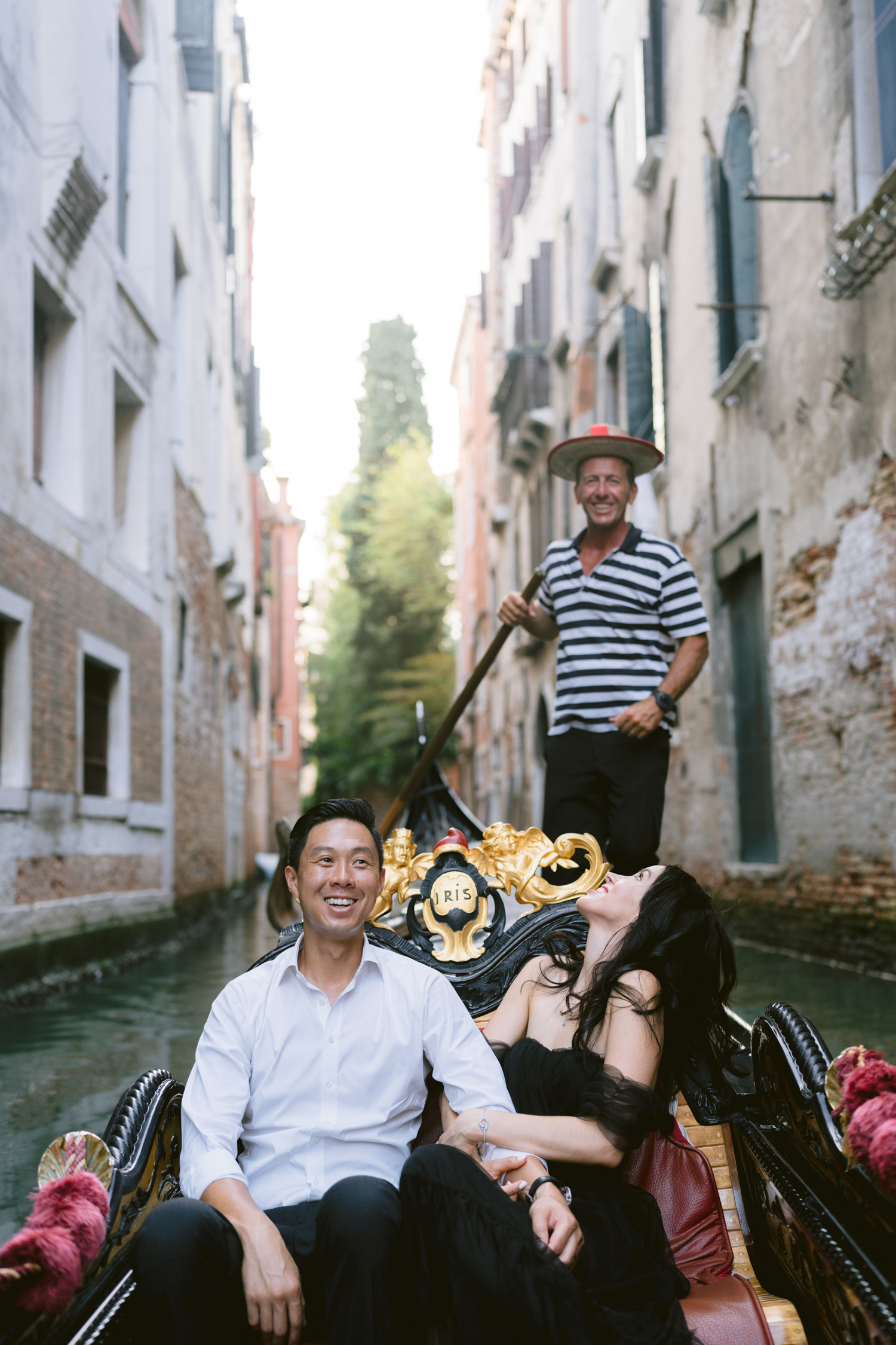 Book a gondola ride for a photoshoot in Venice